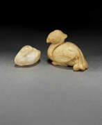 Liao dynasty. TWO SMALL JADE FIGURES OF RECUMBENT BIRDS