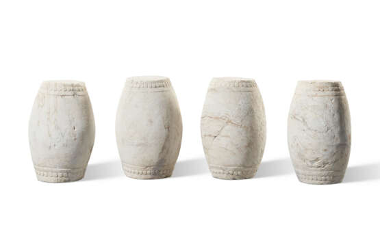 A SET OF FOUR CARVED WHITE MARBLE DRUM STOOLS - photo 1