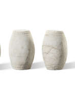 Stool. A SET OF FOUR CARVED WHITE MARBLE DRUM STOOLS