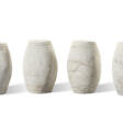 A SET OF FOUR CARVED WHITE MARBLE DRUM STOOLS - Auction archive
