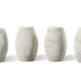 A SET OF FOUR CARVED WHITE MARBLE DRUM STOOLS - фото 1