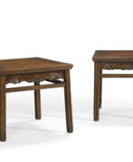 Lacquered wood. A PAIR OF LACQUERED JUMU STOOLS