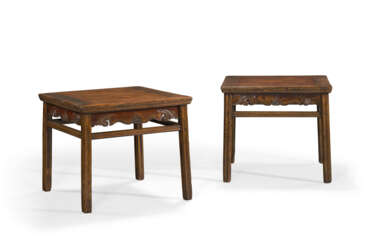 A PAIR OF LACQUERED JUMU STOOLS