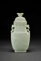 A WHITE JADE ARCHAISTIC VASE AND COVER