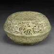 A WELL-CARVED PALE GREY-GREEN JADE RETICULATED PARFUMIER AND COVER - Archives des enchères