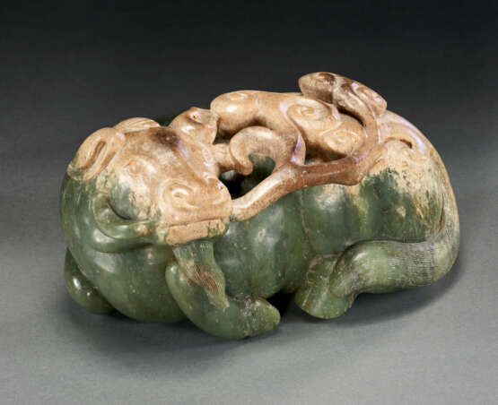 A LARGE SPINACH-GREEN AND OPAQUE MILKY BROWN JADE FIGURE OF MYTHICAL BEAST - фото 1