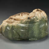 A LARGE SPINACH-GREEN AND OPAQUE MILKY BROWN JADE FIGURE OF MYTHICAL BEAST - photo 2