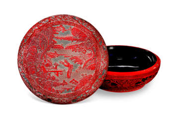 A CARVED RED AND BLACK LACQUER BOX AND COVER