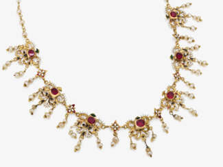 A necklace with bright red garnets, pearls and enamel. Probably Austria or Prague, circa 1600-1610