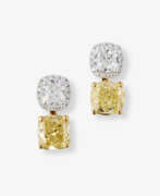 Украшения для ушей. Convertible, highlighted stud earrings decorated with a natural white and yellow diamond. Belgium, ANTWERP ATELIERS