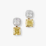 Convertible, highlighted stud earrings decorated with a natural white and yellow diamond. Belgium, ANTWERP ATELIERS - photo 1