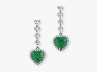 A pair of drop earrings with emeralds and brilliant-cut diamonds.