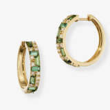 A pair of hoop earrings decorated with fine green tourmalines and brilliant-cut diamonds. Germany - фото 1