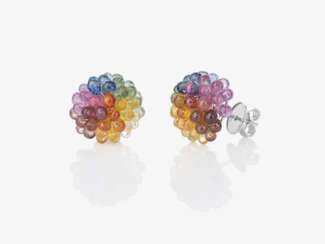 A pair of stud earrings decorated with multi-coloured briolette-cut sapphires. Germany