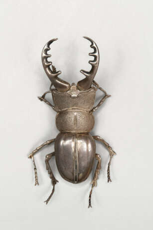 A SMALL SILVER ARTICULATED SCULPTURE OF A STAG BEETLE - photo 1