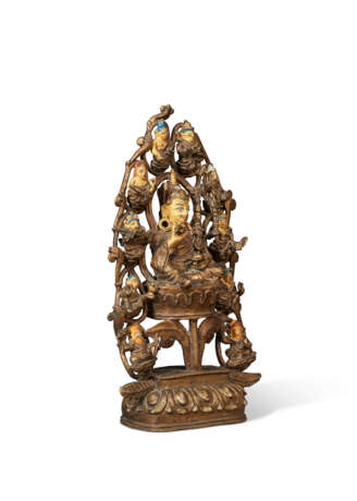 A BRONZE FIGURE OF PADMASAMBHAVA WITH MANIFESTATIONS AND DISCIPLES - фото 2