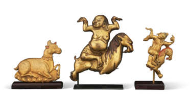 THREE GILT-BRONZE PLAQUES WITH MYTHOLOGICAL BEASTS