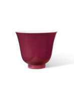 Tasses. A RUBY-PINK-ENAMELED CUP