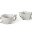 TWO CARVED WHITE STONE TWO-HANDLED CUPS - Auktionsarchiv