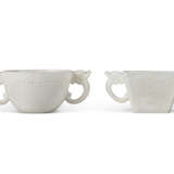 TWO CARVED WHITE STONE TWO-HANDLED CUPS - фото 4