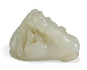 A SMALL WHITE JADE CARVING OF TWO HORSES