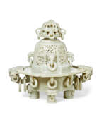 Objets religieux. A CARVED GREENISH-WHITE JADE OCTAGONAL CENSER AND COVER