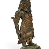 A PARCEL-GILT AND PAINTED BRONZE FIGURE OF A STANDING GUARDIAN - photo 3
