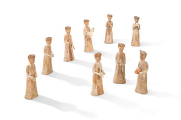 A GROUP OF NINE PAINTED POTTERY FIGURES OF FEMALE MUSICIANS