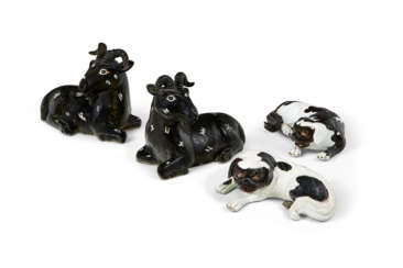 TWO PAIRS OF ENAMELED FIGURES OF ANIMALS