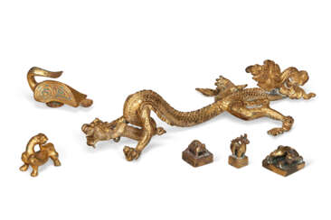 A GILT-BRONZE MODEL OF A DRAGON