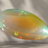 Opal von ca. 30ct in Tropfenform mit interessantem Farbspiel… - Foto 3