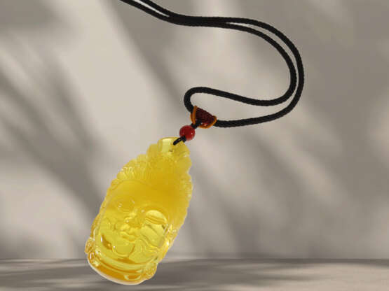Chain/necklace: fabric strap with beautiful carved amber pen… - photo 1