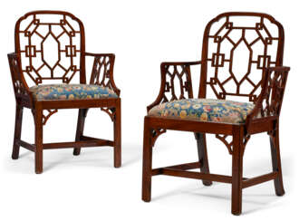 A PAIR OF GEORGE III SOLID MAHOGANY COCKPEN ARMCHAIRS