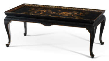 A CHINESE EXPORT BLACK AND GILT LACQUER LOW TABLE