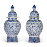 A PAIR OF DUTCH DELFT BLUE AND WHITE JARS AND COVERS - photo 1