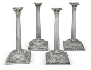 A SET OF FOUR GEORGE II SILVER CANDLESTICKS