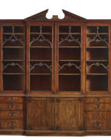 AN EARLY GEORGE III MAHOGANY BREAKFRONT-BOOKCASE