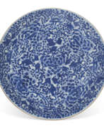 Porcelain. A JAPANESE BLUE AND WHITE SHALLOW BOWL