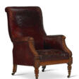 A VICTORIAN LEATHER-UPHOLSTERED OAK LIBRARY ARMCHAIR - Auktionsarchiv