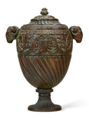 AN ITALIAN BRONZE URN AND COVER