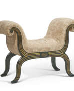 Upholstery. A REGENCY STYLE EBONIZED AND PARCEL-GILT WINDOW SEAT