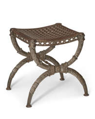 A FRENCH CAST-IRON 'CURULE' STOOL