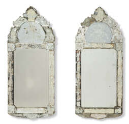 A PAIR OF NORTH EUROPEAN ENGRAVED GLASS MIRRORS