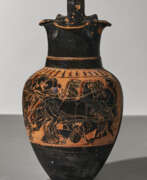 Pottery. AN ATTIC BLACK-FIGURED TREFOIL OINOCHOE