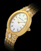 Tiffany & Co.. TIFFANY & CO., GOLD AND DIAMOND-SET WRISTWATCH WITH MOTHER-OF-PEARL DIAL 