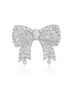 Brooches and pins. VAN CLEEF & ARPELS DIAMOND BOW BROOCH