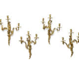 A SET OF FOUR FRENCH ORMOLU THREE-BRANCH WALL LIGHTS - photo 1