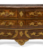 Dressers & Chests of drawers. A REGENCE ORMOLU-MOUNTED BOIS SATINE COMMODE