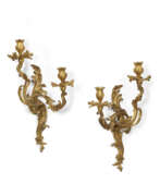 Appliques murales. A PAIR OF LOUIS XV ORMOLU TWO-BRANCH WALL LIGHTS