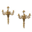 A PAIR OF RESTAURATION ORMOLU AND PATINATED-BRONZE THREE-BRANCH WALL-LIGHTS - Archives des enchères